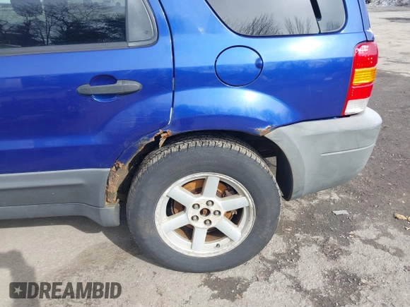 2005 Ford Escape Hybrid with VIN 1FMCU96HX5KC07148, listed as a IAAI auction lot 41741158 with 225,598 mi miles. Bid and sale history available at carsss.com. Image 13.
