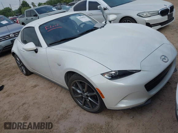 2021 Mazda MX-5 Miata Grand Touring with VIN JM1NDAM71M0454514, listed as a IAAI auction lot 41940252 with Not provided miles and . Bid and sale history available at DreamBid. Image 1.
