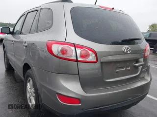 2011 Hyundai Santa Fe GLS z VIN 5XYZGDAB1BG027604, wystawiony jako IAAI lot #42219358 z przebiegiem 145 948 mil mil oraz . Historia ofert i sprzedaży dostępna na DreamBid. Obrazek 3.