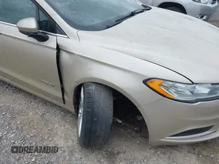 2018 Ford Fusion S z VIN 3FA6P0UU0JR157005, wystawiony jako IAAI lot #41689881 z przebiegiem Nie podano mil oraz . Historia ofert i sprzedaży dostępna na DreamBid. Obrazek 6.