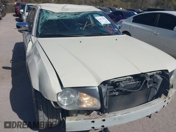 2005 Chrysler 300 with VIN 2C3JA63H55H575644, listed as a IAAI auction lot 41832290 with 184,108 mi miles. Bid and sale history available at carsss.com. Image 6.
