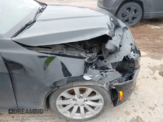 2018 Cadillac ATS RWD z VIN 1G6AA5RX7J0183805, wystawiony jako IAAI lot #41398076 z przebiegiem 103 784 mil mil oraz . Historia ofert i sprzedaży dostępna na DreamBid. Obrazek 6.