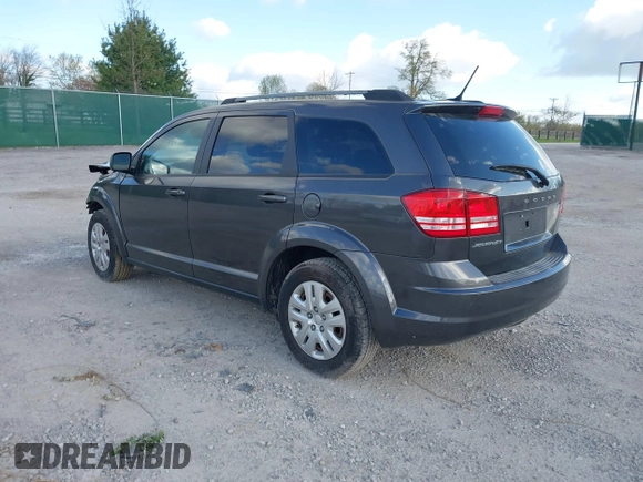 2017 Dodge Journey SE with VIN 3C4PDCAB0HT701477, listed as a IAAI auction lot 42025733 with 168,269 mi miles and . Bid and sale history available at DreamBid. Image 3.