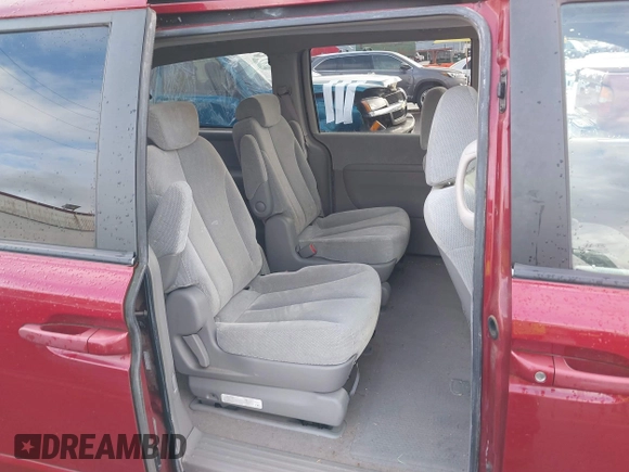2006 Kia Sedona LX with VIN KNDMB233X66030979, listed as a IAAI auction lot 41933430 with 127,305 mi miles and . Bid and sale history available at DreamBid. Image 8.