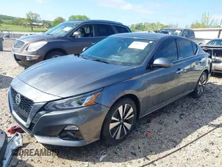 2019 Nissan Altima SL with VIN 1N4BL4EV7KC200795, listed as a IAAI auction lot 42064325 with 233,884 mi miles and . Bid and sale history available at DreamBid. Image 2.