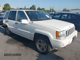 1998 Jeep Grand Cherokee with VIN 1J4FX78S2WC281501, listed as a IAAI auction lot 42140170 with 177,575 mi miles and . Bid and sale history available at DreamBid. Image 1.