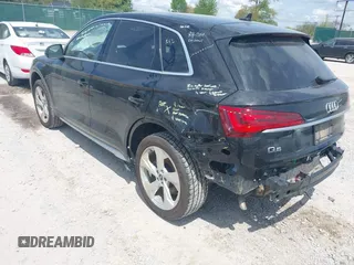 2021 Audi Q5 Premium Plus with VIN WA1BAAFY7M2024762, listed as a IAAI auction lot 42090408 with 58,082 mi miles and . Bid and sale history available at DreamBid. Image 3.