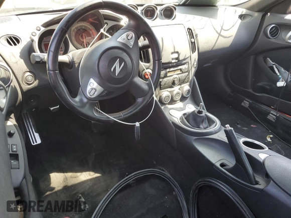 2013 Nissan 370Z Touring z VIN JN1AZ4EHXDM383169, wystawiony jako Copart lot #59787045 z przebiegiem 76 601 mil mil oraz Szkoda całkowita • Salvage title. Historia ofert i sprzedaży dostępna na DreamBid. Obrazek 8.