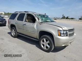 2013 Chevrolet Tahoe LTZ with VIN 1GNSCCE00DR186948, listed as a Copart auction lot 53054575 with 143,048 mi miles and Non repairable. Bid and sale history available at DreamBid. Image 4.