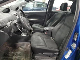 2009 Toyota Yaris with VIN JTDBT903991315725, listed as a Copart auction lot 52566735 with 177,044 mi miles and Salvage Title. Bid and sale history available at DreamBid. Image 7.