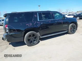 2017 Chevrolet Suburban Premier with VIN 1GNSKJKC8HR285321, listed as a IAAI auction lot 41796659 with 128,113 mi miles and . Bid and sale history available at DreamBid. Image 4.