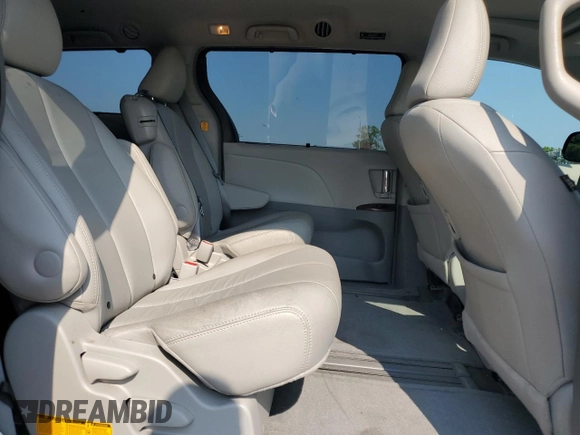2013 Toyota Sienna XLE AAS with VIN 5TDYK3DC0DS357281, listed as a Copart auction lot 61640645 with 69,262 mi miles and Salvage title. Bid and sale history available at DreamBid. Image 10.