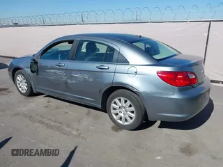 2010 Chrysler Sebring Touring z VIN 1C3CC4FB4AN173629, wystawiony jako IAAI lot #42219561 z przebiegiem 145 054 mil mil oraz . Historia ofert i sprzedaży dostępna na DreamBid. Obrazek 3.