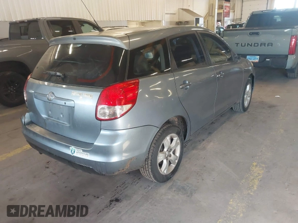 2004 Toyota Matrix Std with VIN 2T1LR32EX4C285993, listed as a IAAI auction lot 41401580 with 216,603 mi miles. Bid and sale history available at carsss.com. Image 4.