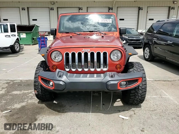 2009 Jeep Wrangler X z VIN 1J4FA24139L740959, wystawiony jako Copart lot #56509075 z przebiegiem 121 927 mil mil oraz Szkoda całkowita • Salvage title. Historia ofert i sprzedaży dostępna na DreamBid. Obrazek 13.