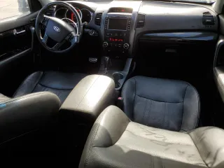 2012 Kia Sorento SX with VIN 5XYKWDA29CG302920, listed as a Copart auction lot 56237235 with 137,998 mi miles and Salvage title. Bid and sale history available at DreamBid. Image 8.