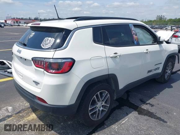 2019 Jeep Compass Latitude with VIN 3C4NJCBB3KT832196, listed as a IAAI auction lot 42210113 with 70,241 mi miles and . Bid and sale history available at DreamBid. Image 4.
