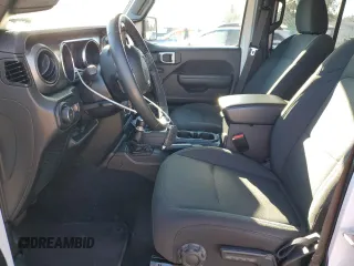 2022 Jeep Wrangler Unlimited Willys with VIN 1C4HJXDM4NW241859, listed as a Copart auction lot 42206205 with 31,449 mi miles and Salvage Title. Bid and sale history available at DreamBid. Image 7.