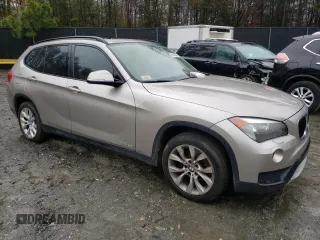 2014 BMW X1 xDrive28i with VIN WBAVL1C52EVY15236, listed as a Copart auction lot 50140885 with 141,088 mi miles and Salvage Title. Bid and sale history available at carsss.com. Image 4.