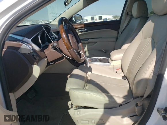 2012 Cadillac SRX Performance Collection with VIN 3GYFNEE33CS659161, listed as a Copart auction lot 76071724 with 149,586 mi miles and Salvage title. Bid and sale history available at DreamBid. Image 6.