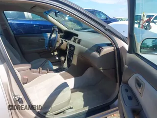 2001 Toyota Camry CE z VIN 4T1BG22K01U053432, wystawiony jako IAAI lot #42257822 z przebiegiem 128 610 mil mil oraz . Historia ofert i sprzedaży dostępna na DreamBid. Obrazek 5.