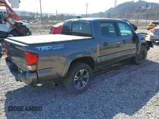 2018 Toyota Tacoma SR with VIN 5TFCZ5AN9JX123749, listed as a IAAI auction lot 41768884 with 42,852 mi miles and . Bid and sale history available at DreamBid. Image 4.