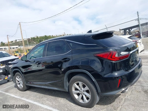 2016 Lexus RX 350 with VIN 2T2ZZMCA7GC019908, listed as a IAAI auction lot 41670619 with NaN miles. Bid and sale history available at carsss.com. Image 14.