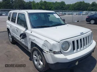 2014 Jeep Patriot Sport with VIN 1C4NJPBA3ED869659, listed as a IAAI auction lot 42590584 with 60,194 mi miles and . Bid and sale history available at DreamBid. Image 1.
