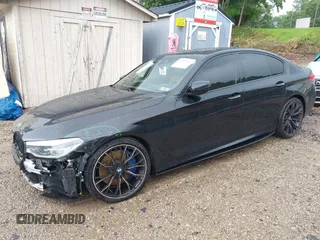 2018 BMW 5 Series M550i xDrive with VIN WBAJB9C5XJB286923, listed as a IAAI auction lot 42527301 with 76,923 mi miles and . Bid and sale history available at DreamBid. Image 22.