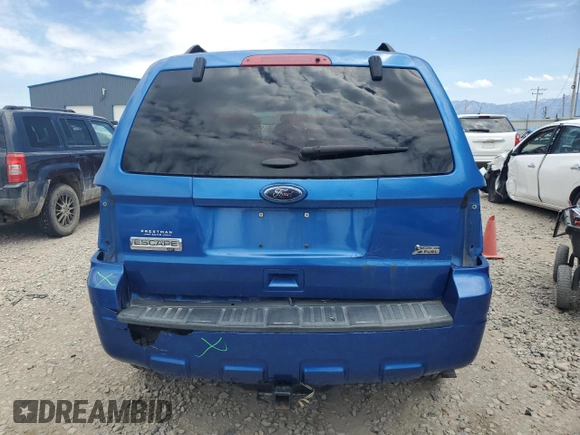 2012 Ford Escape XLT z VIN 1FMCU9DG4CKB11880, wystawiony jako Copart lot #61554935 z przebiegiem 139 385 mil mil oraz Szkoda całkowita • Salvage title. Historia ofert i sprzedaży dostępna na DreamBid. Obrazek 6.