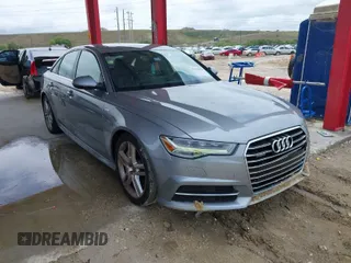 2016 Audi A6 3.0T Premium Plus with VIN WAUFGAFC1GN047352, listed as a IAAI auction lot 41934958 with 111,834 mi miles. Bid and sale history available at carsss.com. Image 1.