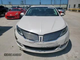 2015 Lincoln MKZ Hybrid with VIN 3LN6L2LU7FR606265, listed as a Copart auction lot 54239485 with 139,821 mi miles and Clean title. Bid and sale history available at DreamBid. Image 5.