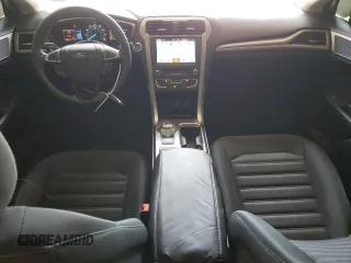 2018 Ford Fusion SE z VIN 3FA6P0HDXJR130677, wystawiony jako Copart lot #51737345 z przebiegiem 129 918 mil mil oraz Szkoda całkowita • Salvage title. Historia ofert i sprzedaży dostępna na DreamBid. Obrazek 8.