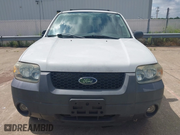 2006 Ford Escape XLT z VIN 1FMCU03106KA68555, wystawiony jako IAAI lot #42639823 z przebiegiem 147 320 mil mil oraz . Historia ofert i sprzedaży dostępna na DreamBid. Obrazek 13.