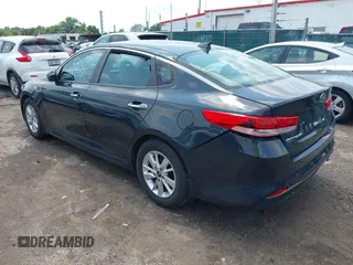 2016 Kia Optima LX z VIN 5XXGT4L37GG087200, wystawiony jako IAAI lot #42456982 z przebiegiem 86 910 mil mil oraz . Historia ofert i sprzedaży dostępna na DreamBid. Obrazek 3.
