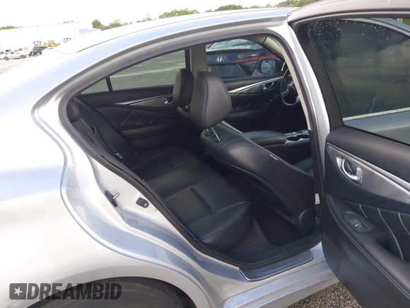 2015 Infiniti Q50 Premium with VIN JN1BV7AP9FM358782, listed as a IAAI auction lot 41103963 with 96,853 mi miles. Bid and sale history available at carsss.com. Image 8.