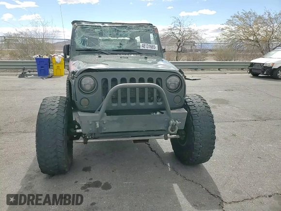 2012 Jeep Wrangler Unlimited Rubicon с VIN 1C4HJWFG4CL103531, выставлен на аукционе Copart как лот 48131665 с пробегом 183 234 миль миль и Списание • Salvage title. История ставок и продаж доступна на DreamBid. Изображение 11.