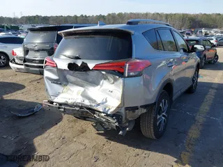 2016 Toyota RAV4 LE with VIN 2T3ZFREV0GW235051, listed as a IAAI auction lot 41750295 with 157,132 mi miles. Bid and sale history available at carsss.com. Image 4.