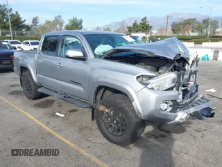 2021 Toyota Tacoma 4WD SR with VIN 5TFCZ5ANXMX281019, listed as a IAAI auction lot 41187762 with 34,061 mi miles. Bid and sale history available at carsss.com. Image 1.