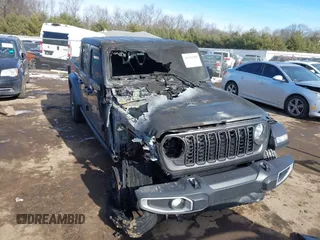 2024 Jeep Gladiator Willys with VIN 1C6HJTAG7RL109913, listed as a IAAI auction lot 41419209 with 6,581 mi miles and . Bid and sale history available at DreamBid. Image 6.