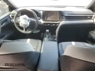 2025 Toyota Camry LE z VIN 4T1DAACK4SU588882, wystawiony jako Copart lot #52717395 z przebiegiem Nie podano mil oraz Szkoda całkowita • Salvage title. Historia ofert i sprzedaży dostępna na DreamBid. Obrazek 8.