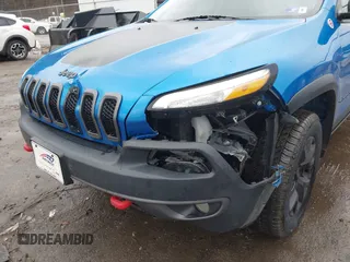 2018 Jeep Cherokee Trailhawk with VIN 1C4PJMBX3JD512813, listed as a IAAI auction lot 41457312 with 125,644 mi miles. Bid and sale history available at carsss.com. Image 6.