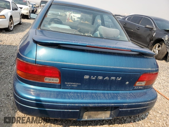 1995 Subaru Impreza with VIN JF1GC6552SH511488, listed as a Copart auction lot 88160855 with 101,767 mi miles and Salvage title. Bid and sale history available at DreamBid. Image 6.