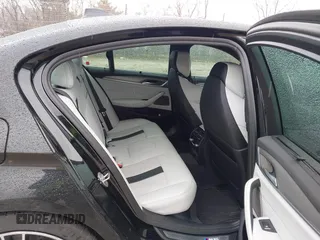 2020 BMW M5 Competition z VIN WBSJF0C00LCD37331, wystawiony jako IAAI lot #41738410 z przebiegiem 49 788 mil mil oraz . Historia ofert i sprzedaży dostępna na DreamBid. Obrazek 8.