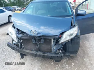 2015 Toyota Sienna LE AAS with VIN 5TDKK3DCXFS624984, listed as a IAAI auction lot 42560632 with 169,034 mi miles and . Bid and sale history available at DreamBid. Image 6.