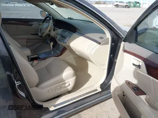 2009 Toyota Avalon XL with VIN 4T1BK36B59U325810, listed as a IAAI auction lot 41337809 with 184,476 mi miles and . Bid and sale history available at carsss.com. Image 5.