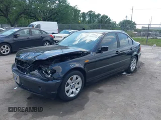 2002 BMW 3 Series 325i with VIN WBAET37412NG78995, listed as a IAAI auction lot 41965274 with 131,138 mi miles. Bid and sale history available at carsss.com. Image 2.