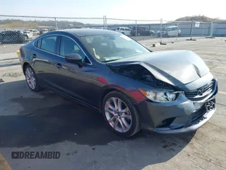 2014 Mazda 6 i Touring with VIN JM1GJ1T62E1157967, listed as a IAAI auction lot 42056357 with 80,841 mi miles and . Bid and sale history available at DreamBid. Image 1.