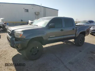 2012 Toyota Tacoma PreRunner with VIN 3TMJU4GN3CM129465, listed as a Copart auction lot 65024765 with 156,819 mi miles and Salvage title. Bid and sale history available at DreamBid. Image 1.