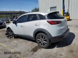 2018 Mazda CX-3 Touring z VIN JM1DKFC74J0312864, wystawiony jako Copart lot #55862845 z przebiegiem 75 584 mil mil oraz Szkoda całkowita • Salvage title. Historia ofert i sprzedaży dostępna na DreamBid. Obrazek 2.